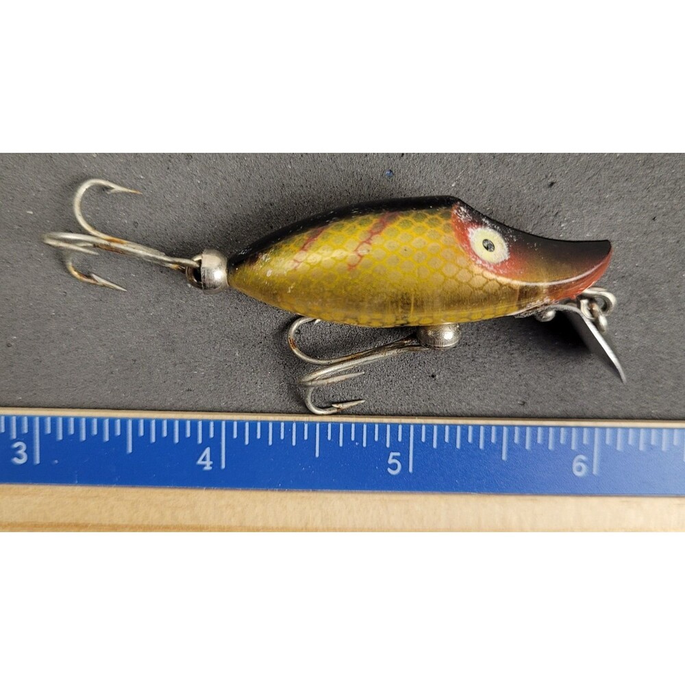 Vintage Heddon Tiny Runt Spook Sinker in a Golden Shiner Fishing Lure